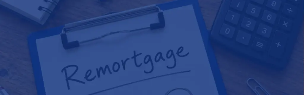 Remortgage advice UK concept with house keys, calculator, and Remortgage document on a wooden desk, helping homeowners explore mortgage options.